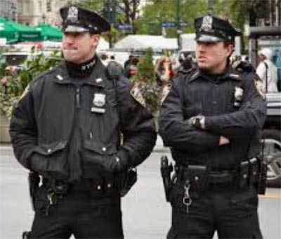 American policemen in all black uniforms