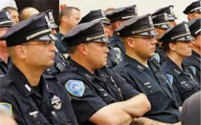 American police looking grumpy in black